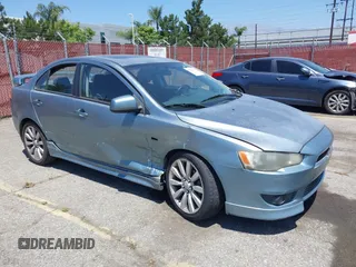 2008 Mitsubishi Lancer GTS z VIN JA3AU86U38U021896, wystawiony jako IAAI lot #42294311 z przebiegiem 188 937 mil mil oraz . Historia ofert i sprzedaży dostępna na DreamBid. Obrazek 1.