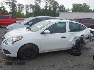 2016 Nissan Versa S z VIN 3N1CN7AP3GL904475, wystawiony jako IAAI lot #42108162 z przebiegiem 91 000 mil mil oraz . Historia ofert i sprzedaży dostępna na DreamBid. Obrazek 14.