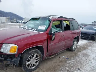2006 GMC Envoy Denali with VIN 1GKET63M162337213, listed as a IAAI auction lot 41292801 with 133,201 mi miles. Bid and sale history available at carsss.com. Image 6.