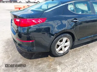 2015 Kia Optima LX with VIN 5XXGM4A71FG387980, listed as a IAAI auction lot 42330602 with 96,189 mi miles and . Bid and sale history available at DreamBid. Image 6.