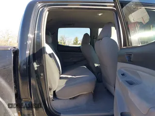 2009 Toyota Tacoma PreRunner with VIN 3TMJU62N99M074807, listed as a IAAI auction lot 41664211 with 230,481 mi miles. Bid and sale history available at carsss.com. Image 8.