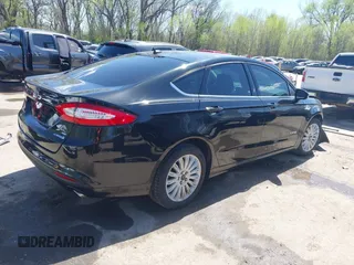 2014 Ford Fusion SE Hybrid with VIN 3FA6P0LU4ER252089, listed as a IAAI auction lot 41982070 with 47,512 mi miles. Bid and sale history available at carsss.com. Image 4.