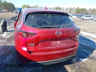 2017 Mazda CX-5 Touring with VIN JM3KFBCL1H0227290, listed as a IAAI auction lot 41400188 with 58,801 mi miles. Bid and sale history available at carsss.com. Image 16.