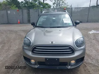 2018 MINI Countryman Cooper z VIN WMZYV5C39J3E02982, wystawiony jako IAAI lot #42384795 z przebiegiem 74 599 mil mil oraz . Historia ofert i sprzedaży dostępna na DreamBid. Obrazek 12.