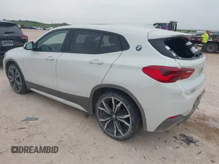 2018 BMW X2 xDrive28i z VIN WBXYJ5C31JEF82624, wystawiony jako IAAI lot #42066439 z przebiegiem 79 454 mil mil oraz . Historia ofert i sprzedaży dostępna na DreamBid. Obrazek 3.