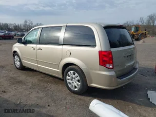 2014 Dodge Grand Caravan SE with VIN 2C4RDGBG2ER428860, listed as a IAAI auction lot 41999286 with 113,989 mi miles. Bid and sale history available at carsss.com. Image 3.