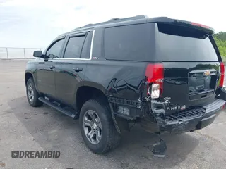 2017 Chevrolet Tahoe LT z VIN 1GNSKBKC8HR311969, wystawiony jako IAAI lot #42126414 z przebiegiem 160 994 mil mil oraz . Historia ofert i sprzedaży dostępna na DreamBid. Obrazek 3.