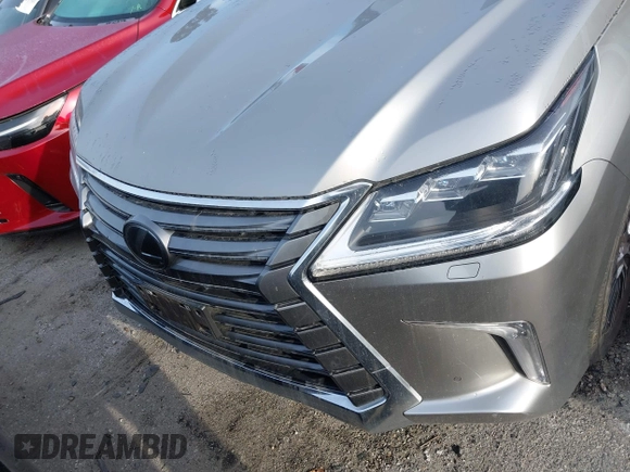 2021 Lexus LX 570 z VIN JTJDY7AX9M4335171, wystawiony jako IAAI lot #41754348 z przebiegiem 32 119 mil mil oraz . Historia ofert i sprzedaży dostępna na DreamBid. Obrazek 12.