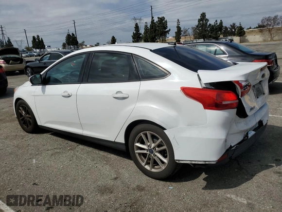 2016 Ford Focus SE with VIN 1FADP3F23GL362328, listed as a Copart auction lot 54898205 with 86,323 mi miles and Salvage title. Bid and sale history available at DreamBid. Image 2.