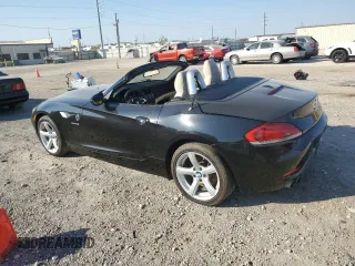 2012 BMW Z4 sDrive28i with VIN WBALL5C5XCE716711, listed as a Copart auction lot 75706534 with 89,948 mi miles and Clean Title. Bid and sale history available at carsss.com. Image 2.