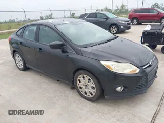 2012 Ford Focus SE with VIN 1FAHP3F21CL372769, listed as a IAAI auction lot 42107424 with 202,142 mi miles. Bid and sale history available at carsss.com. Image 1.