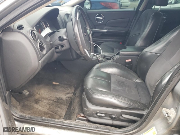 2008 Pontiac Grand Prix GXP with VIN 2G2WC55C581112024, listed as a Copart auction lot 69037534 with 143168 miles and Salvage Title. Bid and sale history available at carsss.com. Image 7.