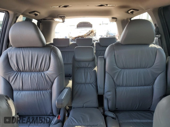 2010 Honda Odyssey EX-L with VIN 5FNRL3H62AB031763, listed as a Copart auction lot 52800055 with 220,450 mi miles and Salvage Title. Bid and sale history available at DreamBid. Image 10.