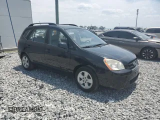 2009 Kia Rondo LX with VIN KNAFG528097250880, listed as a Copart auction lot 52632615 with 127,228 mi miles and Salvage Title. Bid and sale history available at carsss.com. Image 4.