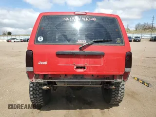 1999 Jeep Cherokee Sport with VIN 1J4FF68S6XL574980, listed as a Copart auction lot 51639635 with 257,854 mi miles and Salvage Title. Bid and sale history available at carsss.com. Image 6.
