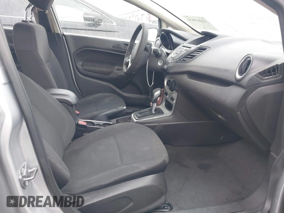 2017 Ford Fiesta SE with VIN 3FADP4BJXHM116900, listed as a IAAI auction lot 41815656 with 74,662 mi miles and . Bid and sale history available at DreamBid. Image 5.