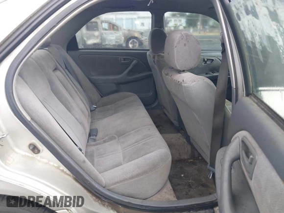2000 Toyota Camry CE z VIN 4T1BG22KXYU690984, wystawiony jako IAAI lot #42222118 z przebiegiem 292 017 mil mil oraz . Historia ofert i sprzedaży dostępna na DreamBid. Obrazek 8.