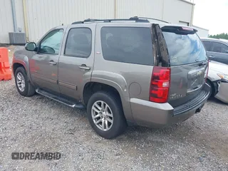 2011 Chevrolet Tahoe LT with VIN 1GNSCBE08BR163408, listed as a IAAI auction lot 42345398 with 283,718 mi miles and . Bid and sale history available at DreamBid. Image 3.