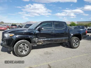 2018 Toyota Tacoma SR5 z VIN 3TMAZ5CN2JM074453, wystawiony jako Copart lot #54905055 z przebiegiem 79 795 mil mil oraz Szkoda całkowita • Salvage title. Historia ofert i sprzedaży dostępna na DreamBid. Obrazek 1.