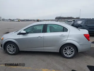 2012 Chevrolet Sonic LT with VIN 1G1JC5SH0C4162034, listed as a IAAI auction lot 41967195 with 87,086 mi miles and . Bid and sale history available at DreamBid. Image 14.