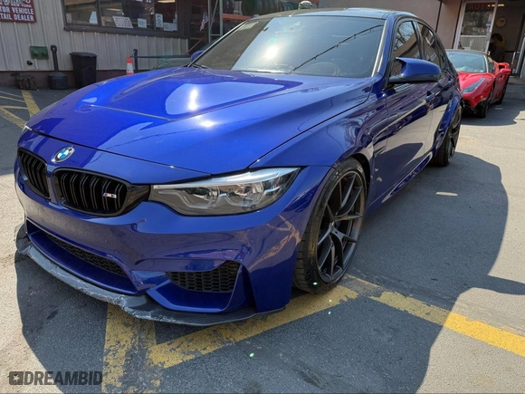 2018 BMW M3 with VIN WBS8M9C59J5L71951, listed as a IAAI auction lot 42129203 with 50,011 mi miles. Bid and sale history available at carsss.com. Image 2.