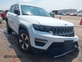 2023 Jeep Grand Cherokee with VIN 1C4RJYB63PC649000, listed as a IAAI auction lot 42306975 with 29,948 mi miles and . Bid and sale history available at DreamBid. Image 1.