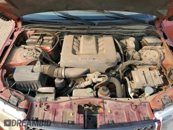 2007 Suzuki Grand Vitara Luxury z VIN JS3TD947374204678, wystawiony jako Copart lot #56880275 z przebiegiem 244 566 mil mil oraz Szkoda całkowita • Salvage title. Historia ofert i sprzedaży dostępna na DreamBid. Obrazek 12.