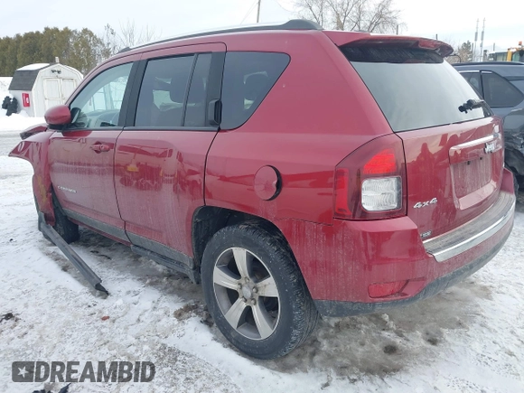 2016 Jeep Compass Latitude with VIN 1C4NJDEBXGD674518, listed as a IAAI auction lot 41956884 with 158,125 mi miles. Bid and sale history available at carsss.com. Image 3.