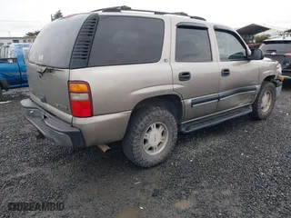 2001 Chevrolet Tahoe LS with VIN 1GNEK13T11R109826, listed as a IAAI auction lot 41473357 with 257,335 mi miles. Bid and sale history available at carsss.com. Image 4.