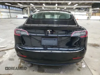 2023 Tesla Model 3 with VIN 5YJ3E1EA5PF439017, listed as a Copart auction lot 53694145 with 73,875 mi miles and Salvage Title. Bid and sale history available at DreamBid. Image 6.