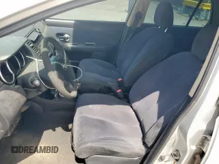 2009 Nissan Versa S with VIN 3N1BC11E39L376873, listed as a Copart auction lot 60299465 with 134,769 mi miles and Salvage title. Bid and sale history available at DreamBid. Image 7.