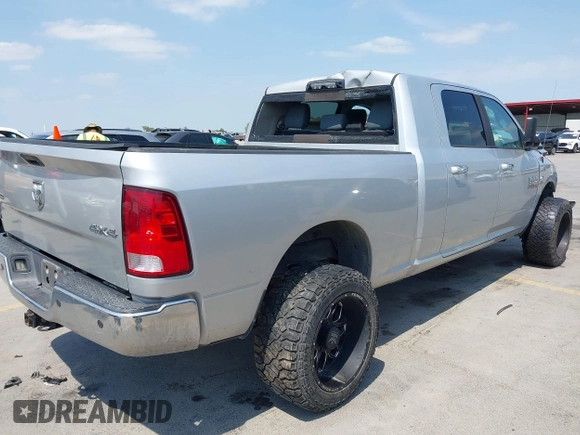 2015 Ram 2500 SLT with VIN 3C6UR5ML9FG611388, listed as a IAAI auction lot 42045503 with 164,547 mi miles and . Bid and sale history available at DreamBid. Image 4.