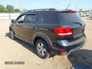 2012 Dodge Journey SXT z VIN 3C4PDCBG0CT290763, wystawiony jako IAAI lot #42553350 z przebiegiem 152 943 mil mil oraz . Historia ofert i sprzedaży dostępna na DreamBid. Obrazek 3.