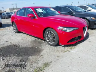2020 Alfa Romeo Giulia with VIN ZARFAMAN1L7636002, listed as a IAAI auction lot 42121135 with 55,510 mi miles. Bid and sale history available at carsss.com. Image 1.