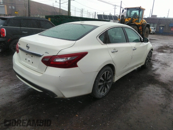 2018 Nissan Altima S with VIN 1N4AL3AP6JC192717, listed as a IAAI auction lot 41827627 with 163,360 mi miles and . Bid and sale history available at DreamBid. Image 4.