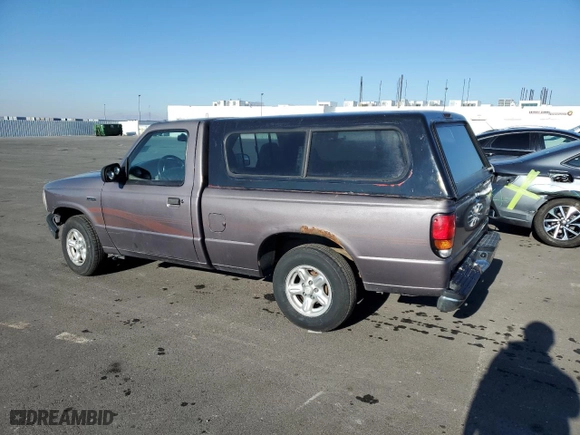 1997 Mazda B-Series 2WD Truck with VIN 4F4CR12A2VTM24064, listed as a Copart auction lot 88822475 with 222,927 mi miles and Clean Title. Bid and sale history available at carsss.com. Image 2.