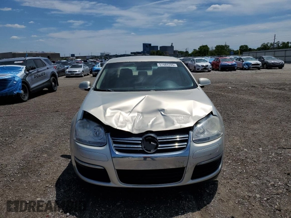 2010 Volkswagen Jetta Limited Edition z VIN 3VWAX7AJ2AM106655, wystawiony jako Copart lot #57489395 z przebiegiem 110 482 mil mil oraz Szkoda całkowita • Salvage title. Historia ofert i sprzedaży dostępna na DreamBid. Obrazek 5.
