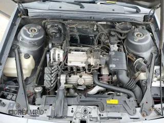 1992 Oldsmobile Cutlass z VIN 1G3AL54N4N6438104, wystawiony jako Copart lot #74415204 z przebiegiem 118 459 mil mil oraz Szkody całkowita. Historia ofert i sprzedaży dostępna na DreamBid. Obrazek 11.