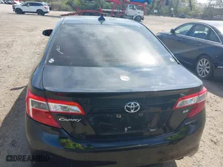 2014 Toyota Camry L with VIN 4T1BF1FK5EU466685, listed as a IAAI auction lot 42040366 with 114,019 mi miles. Bid and sale history available at carsss.com. Image 16.