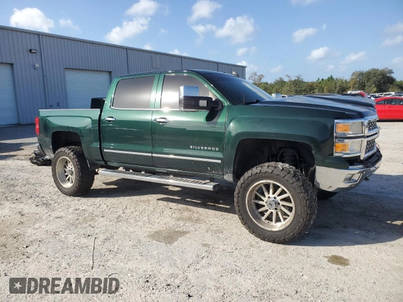 2015 Chevrolet Silverado 1500 LTZ with VIN 3GCUKSEC1FG173590, listed as a Copart auction lot 79028274 with 197,431 mi miles and Salvage Title. Bid and sale history available at carsss.com. Image 4.