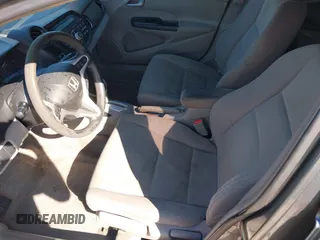 2012 Honda Insight LX with VIN JHMZE2H56CS004226, listed as a IAAI auction lot 41705401 with 131,761 mi miles and . Bid and sale history available at DreamBid. Image 5.