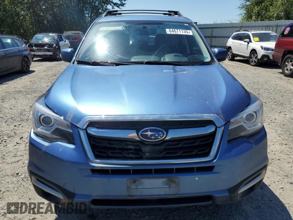 2017 Subaru Forester Touring with VIN JF2SJAWC2HH429099, listed as a Copart auction lot 64671135 with 104,709 mi miles and Salvage title. Bid and sale history available at DreamBid. Image 5.