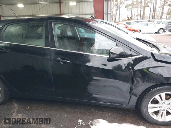 2014 Hyundai Elantra GT with VIN KMHD35LH5EU171863, listed as a IAAI auction lot 41299174 with 89,090 mi miles. Bid and sale history available at carsss.com. Image 12.