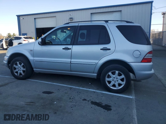 2000 Mercedes-Benz M 320/430/500 with VIN 4JGAB72E0YA167962, listed as a Copart auction lot 89158575 with 194,471 mi miles and Salvage title. Bid and sale history available at DreamBid. Image 2.