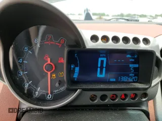 2013 Chevrolet Sonic LTZ z VIN 1G1JE5SH0D4102525, wystawiony jako Copart lot #60976595 z przebiegiem 138 420 mil mil oraz Szkoda całkowita • Salvage title. Historia ofert i sprzedaży dostępna na DreamBid. Obrazek 9.