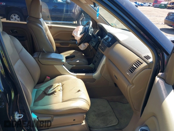 2005 Honda Pilot EX-L with VIN 5FNYF18555B043104, listed as a IAAI auction lot 41888235 with 127,781 mi miles. Bid and sale history available at carsss.com. Image 5.
