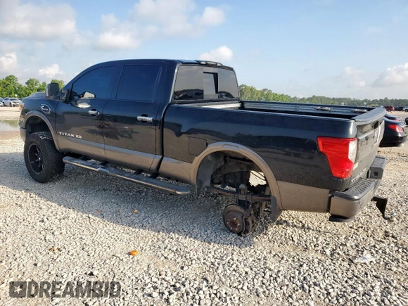 2017 Nissan Titan Platinum Reserve with VIN 1N6BA1F43HN568650, listed as a Copart auction lot 59593525 with 126,193 mi miles and Salvage title. Bid and sale history available at DreamBid. Image 2.