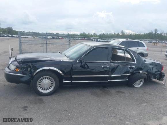 1999 Mercury Grand Marquis LS with VIN 2MEFM75W8XX645350, listed as a IAAI auction lot 40713217 with 56,271 mi miles. Bid and sale history available at carsss.com. Image 11.