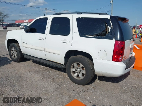 2008 GMC Yukon SLT w/4SB with VIN 1GKFK13068J198356, listed as a IAAI auction lot 42016987 with 244,704 mi miles. Bid and sale history available at carsss.com. Image 3.