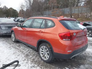2015 BMW X1 xDrive28i with VIN WBAVL1C51FVY33650, listed as a IAAI auction lot 41400985 with 132,484 mi miles. Bid and sale history available at carsss.com. Image 3.